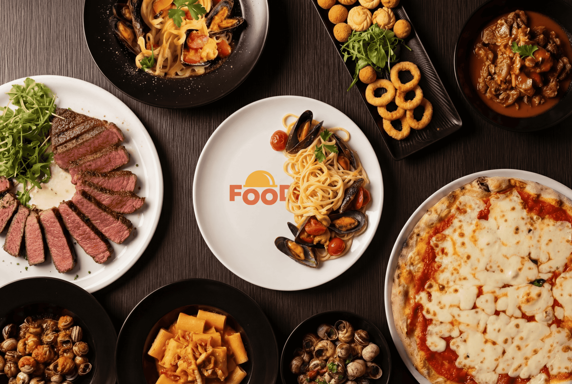 Overhead view of Foodora dishes with logo plate in center, surrounded by spaghetti with mussels, sliced steak, pizza, and other specialties
